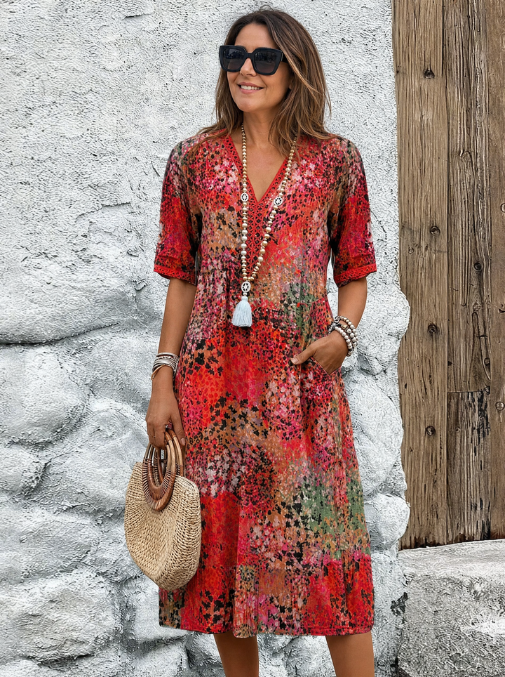 SUSAN | ABITO MIDI DALLA TONALITÀ VIVACE CON ELEGANTE COPERTURA DEL VENTRE